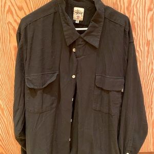 Stussy black flannel shirt. Very comfortable.
